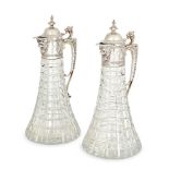 A pair of Garrard & Co. silver mounted cut glass claret jugs, Sheffield, c.1979, the tapering bodies