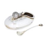 A silver snail salt cellar and spoon by Jocelyn Burton, London, c.1979, of flattened ovoid form,