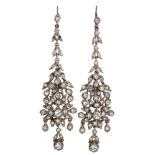 A pair of silver and paste earrings, of tapering foliate design, set with colourless paste,