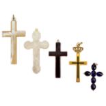 Five cross pendants, comprising: a gold reliquary cross pendant, the hinged cover with black