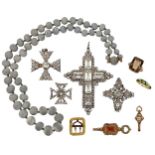 A collection of jewellery comprising: three early 19th century colourless paste set pendent crosses;