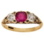 A Victorian ruby and diamond three stone half-hoop ring, the central cushion-shaped ruby flanked