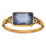 An early 19th century gold and sapphire ring, centering on a rectangular mixed-cut sapphire to