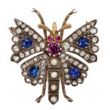 A gem-set and diamond brooch designed as a butterfly, the wings set with mixed-cut sapphires