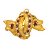 A Victorian gold, garnet and seed pearl brooch, of ribbon design, decorated with lines of cabochon