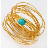 A cultured pearl and turquoise wirework multi-hoop bangle, set with a single baroque cultured