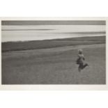 Leonid Nikolaevich Lazarev, Russian 1937-2021- Child running through a field, 1958; photograph,