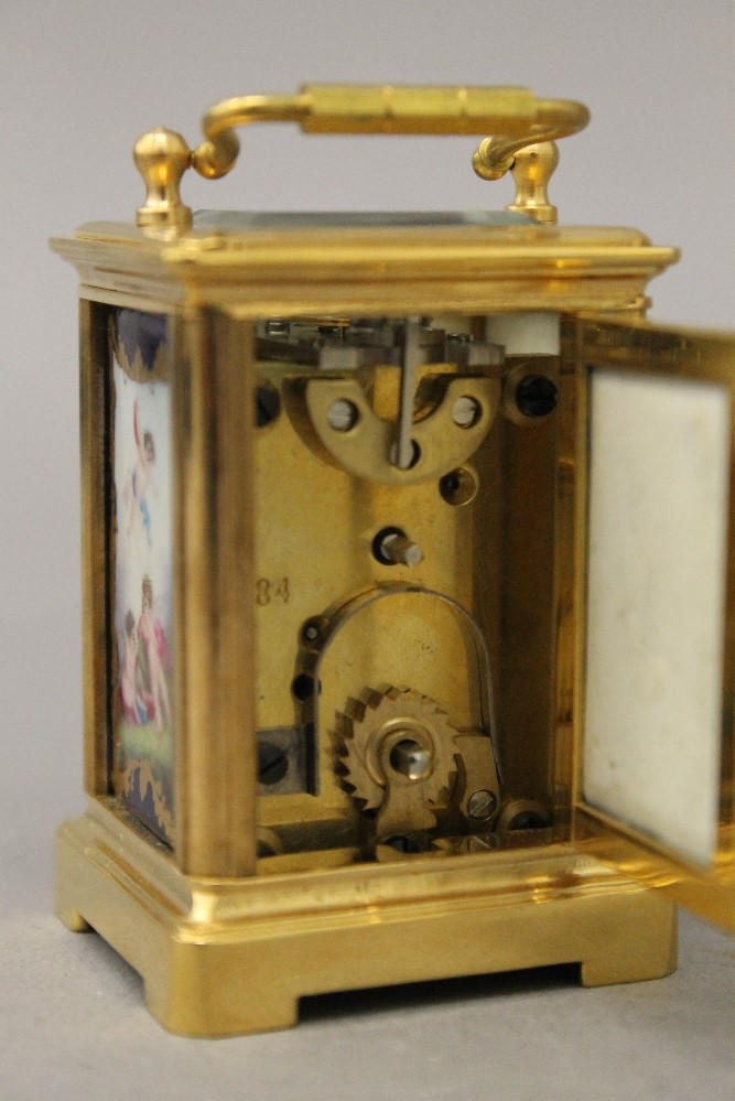 A miniature carriage clock with porcelain panels. 7.5 cm high. - Image 5 of 9