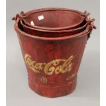 A set of Coke buckets.