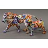 Two graffiti decorated animals. The largest 43 cm long.