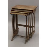 A late 19th/early 20th century nest of four tables. 54 cm wide.