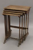 A late 19th/early 20th century nest of four tables. 54 cm wide.