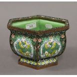 A Chinese enamel decorated planter. 19 cm wide.