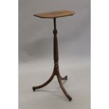 An early 19th century mahogany adjustable reading stand. 41 cm wide.