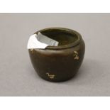 A miniature gold splash bronze censer. 2.5 cm high.