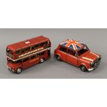 A model of a London bus and a mini. The former 26.5 cm long.
