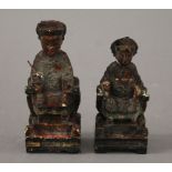 Two Chinese painted wooden figures. The largest 15 cm high.