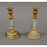 A pair of rock crystal candlesticks. 19 cm high.