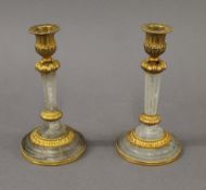 A pair of rock crystal candlesticks. 19 cm high.