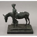 An abstract bronze model of a girl and donkey. 33 cm high.