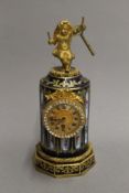 A 19th century Serves style ormolu mounted porcelain clock. 24 cm high.