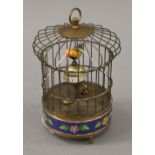 A birdcage clock. 18 cm high.