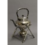 A Chinese silver kettle on stand, with burner, marked for Wang Hing. 31 cm high. 37 troy ounces.