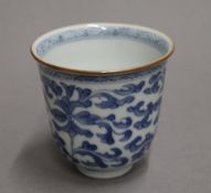 An 18th century Chinese blue and white porcelain bell shaped libation cup. 8 cm high.