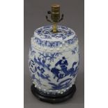 A blue and white porcelain barrel lamp. 40 cm high.