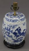 A blue and white porcelain barrel lamp. 40 cm high.