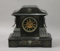 A Victorian black slate mantle clock. 47.5 cm wide, 43.5 cm high.