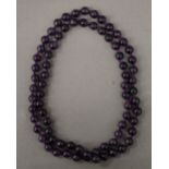 A string of amethyst beads.
