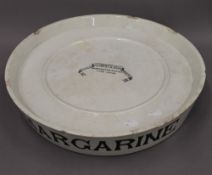 A Victorian white pottery margarine slab. 42 cm diameter.