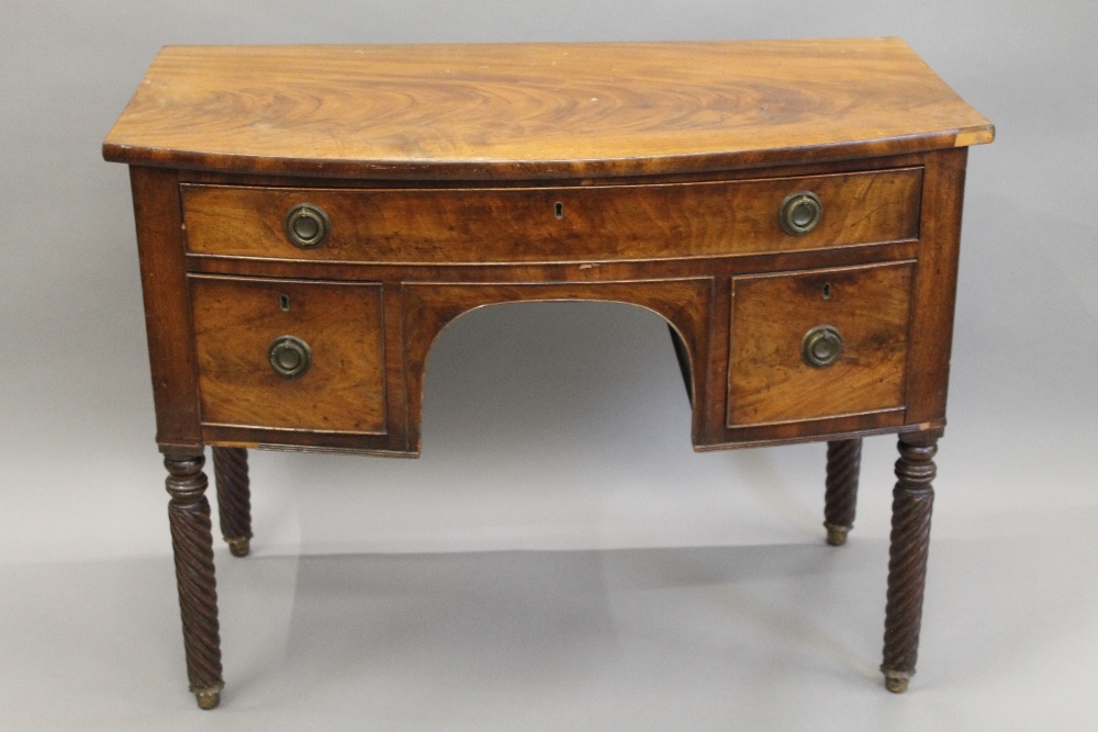 A 19th century mahogany bow front sideboard. 106 cm wide.