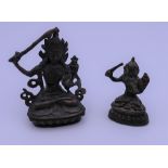 Two small bronze models of buddha. The largest 7.5 cm high.