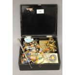 A Japanese lacquered box containing various costume jewellery, etc.