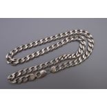A gentleman's silver curb necklace. 54 cm long. 59.4 grammes.