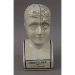 A Phrenology head. 28 cm high.