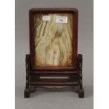 A Chinese hardwood and marble table screen. 28 cm high.