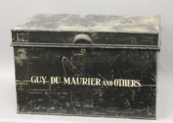 A tin deed trunk, inscribed Guy Du Maurier and others. 67 cm wide.