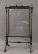 A Victorian ormolu mounted ivory inlaid fire screen. 56 cm wide.