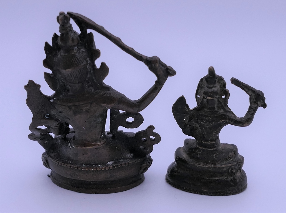 Two small bronze models of buddha. The largest 7.5 cm high. - Image 2 of 9