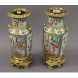 A pair of 19th century Canton vases with ormolu mounts. 41 cm high.