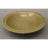 A Chinese Song Celadon twin fish marriage bowl. 21.5 cm diameter.