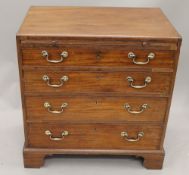 A Georgian mahogany chest of drawers with brushing slide. 75.5 cm wide.