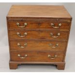 A Georgian mahogany chest of drawers with brushing slide. 75.5 cm wide.