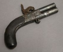 A percussion twin barrel turn over pistol. 16 cm long.