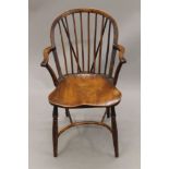 A 19th century stick back Windsor chair. 53.5 cm wide.