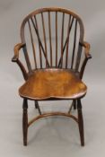 A 19th century stick back Windsor chair. 53.5 cm wide.