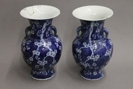 A pair of 19th century Chinese prunus blossom vases. 29.5 cm high.
